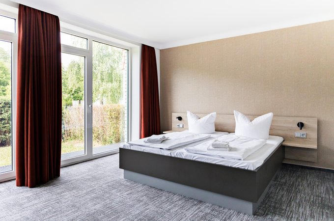 Hotelzimmer Bett